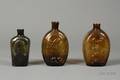 Three Historical Colored Glass Whiskey Flasks