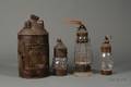 Three Tin and Glass Lanterns and a Horn Lantern