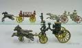 Three Cast Iron HorseDrawn Fire Vehicles