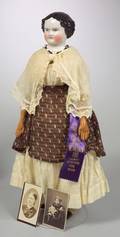 China Shoulder Head Doll and Photograph of Doll and Her Original Owner