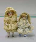 Two Small German AllBisque Dolls