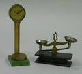 Two Lithographed Tin Toy Scales