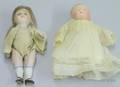Two Small All Bisque Dolls