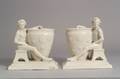 Pair of George Tinworth Design White Glazed Figural Vases