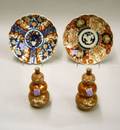 Pair of Japanese Kutani Porcelain Triple Gourdform Vases and Two Imari Plates