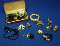 Group of Rhinestone Paste Glass and Goldtone Costume Jewelry and Six Estee Lauder Solid Perfumes