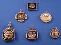 Five Mostly Gold and Enamel Decorated Fraternal Badges