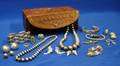 Group of Mexican and Southwestern Silver Jewelry in an Associated Mexican Embossed Leather Jewelry Box