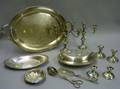 Four Weighted Sterling Silver Candleholders and a Pair of Candelabra Two Silver Plated Serving Utensils and F