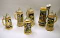 Six German Polychrome Decorated Stoneware Steins