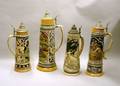 Four Large German Cobalt and Polychrome Decorated Stoneware Steins