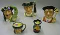 Four Royal Doulton Character Jugs and a Shorter Toby Jug