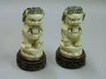 Pair of Asian Carved Ivory Foo Dogs