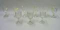 Nine Assorted Colorless Pressed Pattern Glass Goblets
