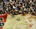 Three Handstitched Pieced Cotton Quilts and a Crib Embroidered Pieced Crazy Quilt
