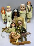 Seven Bisque China Celluloid and Composition Dolls