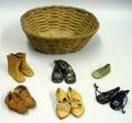 Basket with Five and a Half Pairs of Doll Shoes