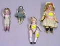 Four Small Bisque Dolls