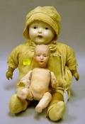 Small Heubach Bisque Baby and a Composition Baby