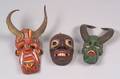 Three Polychrome Carved Wood Masks