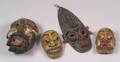 Four Polychrome Carved Wood Masks