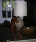 Primitive Carved Pine Riding Horse an Ovoid Stoneware Jug Table Lamp and a Turned Wooden Bowl a Glazed Molded Stoneware Two handled
