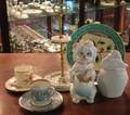 Bisque Figurals a Majolica Dish Two Wedgwood Demitasse Cups and Saucers and a Giltmetal Mounted Porcelain Knife Stand