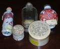 Three Asian Glass and Porcelain Snuff Bottles and Two Small Chinese Carved Ivory Boxes