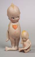 Small Seated Kewpie Reading a Book and Standing Kewpie