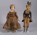 Pair of Painted Papiermache and Carved Wood Dolls