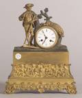 French Gilt and Patinated Bronze Mantel Clock