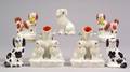 Seven Staffordshire Figural Dogs and Groups