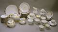 Twentyeight Piece Bavarian Giltbanded Porcelain Partial Tea Set and a Twentythree Piece English Sprigware Pa