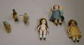Three Small Articulated Rabbit Figures and Three Small German Bisque Articulated Dolls