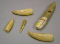 Sailors Carved Whaleform Implement Handle and Nib Two Whales Teeth and a Japanese Carved and Inlaid Ivory