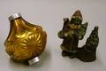 Amber Mercury Glass Ornament and a Painted Cast Metal Santa Claus Figural