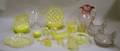 Twentyseven Pieces of Pressed Vaseline Glass a Colorless Glass Compote a Victoria Art Glass Pitcher and a Pair of Frosted Glass Hen