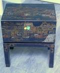 Chinese Export Gilt Decorated Black Lacquer Chest on Frame