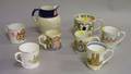 Seven Assorted Commemorative British Monarchy Ceramic Mugs and a Salt Glazed Pitcher