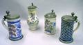 Four Continental Tin Glazed Pottery Steins