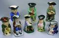 Eight Assorted Pottery Toby Jugs