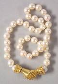 Pearl Necklace with 18kt Clasped Hand Clasp
