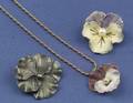 Three Flower Jewelry Items