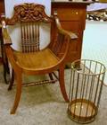 Late Victorian Carved Birch Northwind Savonarola Armchair and an Edwardian Brass Umbrella Stand