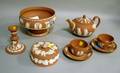 Eight Wedgwood Solid Salmon Jasper Table Items
