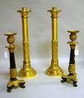 Two Pairs of Neoclassical Gilt Bronze Candlesticks