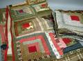 19th Century Log Cabin Pattern Pieced Printed Cotton Coverlet and a Disassembled Quilt Comprised of Approximately Thirty Pieced Panels