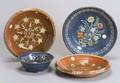 Four Continental Glazed Redware Dishes