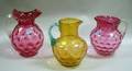Three Late Victorian Thumbprint Pattern Colored Art Glass Pitchers