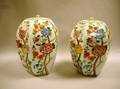 Pair of Asian Hexagonal Floral Decorated Porcelain Covered Jars